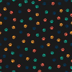 Black seamless pattern with colorful paws