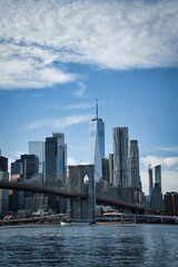 Fototapeta na wymiar Brooklyn Bridge with Manhattan skyline in background in New York City