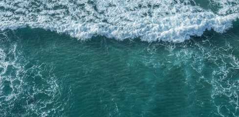 Obraz na płótnie Canvas Ocean foamy pattern on water surface. Top view.