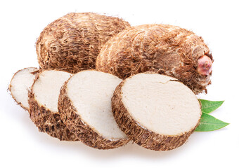 Eddoe or taro tubers and its slices isolated on white background.