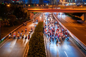 Rush hour in Ho Chi Minh City, one of the most developed cities in Vietnam. With many famous...