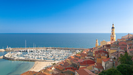 Menton city, old port, blue mediteranean sea and sky