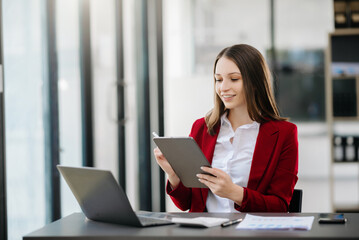 female office businesswoman startup daydreaming about her work, startup and working with laptop on office desk in office room