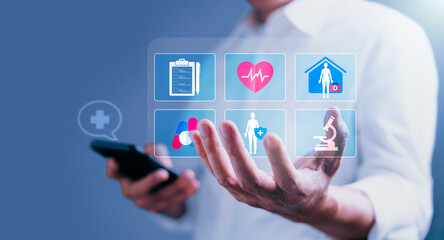 Businessman holding medical service network connection icons with modern interface