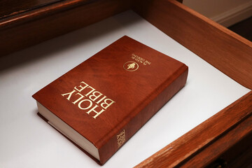 Nottingham_UK_ 20_02_2023 - A Gideon bible placed in a hotel drawer for hotel guests