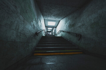 empty stairs in underground tunnel