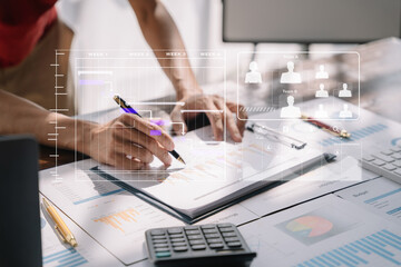 Businessman hand Project manager working and update tasks and Gantt chart scheduling virtual diagram.with smart phone, tablet and laptop in office.