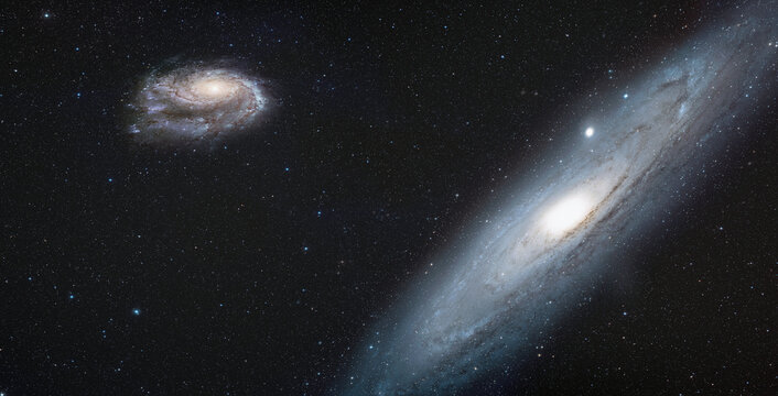 Andromeda galaxy with our galaxy is Milky Way in the  background "Elements of this image furnished by NASA "