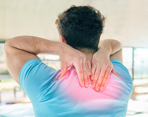 Fitness, back pain and man with injury in gym after accident, workout or training. Sports, health...