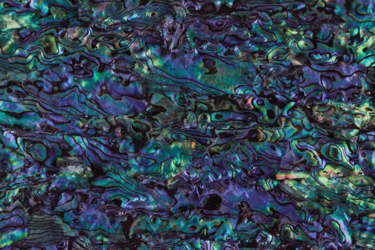 Pearl multi-colored surface with purple green tint