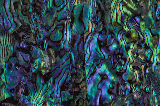 Pearl multi-colored surface with purple green tint
