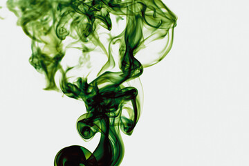 Abstract backdrop with stains of green incense smoke