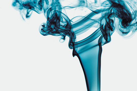 Abstract backdrop with stains of blue incense smoke