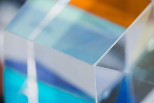 Crystal cube with colorful gradient reflection