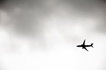 Commercial airplane taking off on a cloudy day