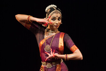 Graceful bharatnatyam dancer with different mudras