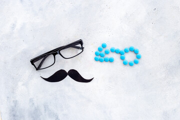 Male sign made of blue pills. Impotence concept