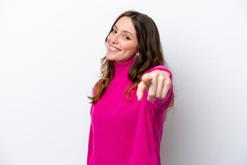 Young caucasian woman isolated on white background pointing front with happy expression