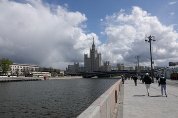Fototapeta na wymiar View of a high-rise building on Kotelnicheskaya embankment and Bolshoy Ustinsky Bridge in Moscow
