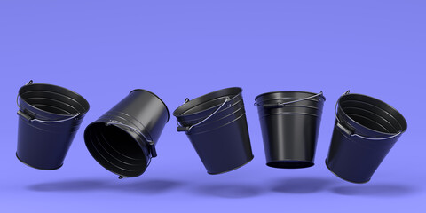 Set of metal garden buckets for hydration of plants on violet background