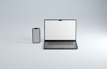 Gunmetal or space grey colored laptop and smartphone on blue studio background. Empty white mockup screen.