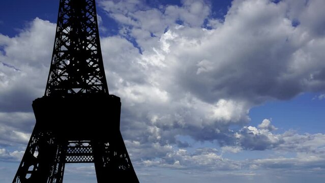  Eiffel Tower in Paris, France (against the background of moving clouds), time lapse