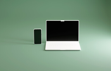 Matte white mockup laptop and smartphone. Green studio setting.