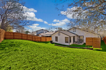 Obraz premium white house with a green lawn 