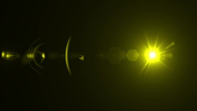 Yellow optical lens flare effect. 4K resolution. Very high quality and realistic.on black background