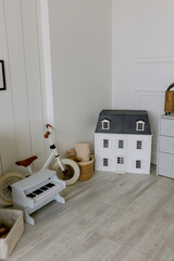 Obraz premium Kids toys. Bicycle, wooden house and piano