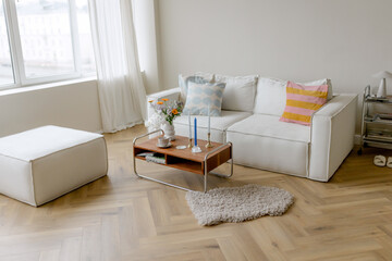 White sofa and coffee table in the room