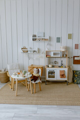 Children's kitchen in a room with toys