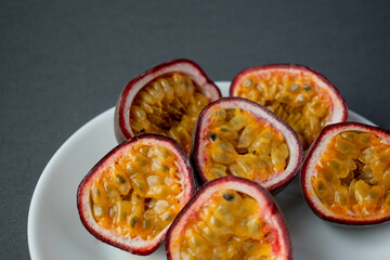 ripe organic passion fruit on a dark background