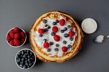 Fresh baked french pancakes with berries