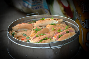 Hot dog in hotpot at street food market, Bangkok, Thailand