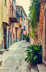 Fototapeta premium Narrow Italian street in Porto Venere in Italy