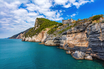 Fototapeta na wymiar Porto Venere coast with Byron's Grotto and Doria castle in Italy