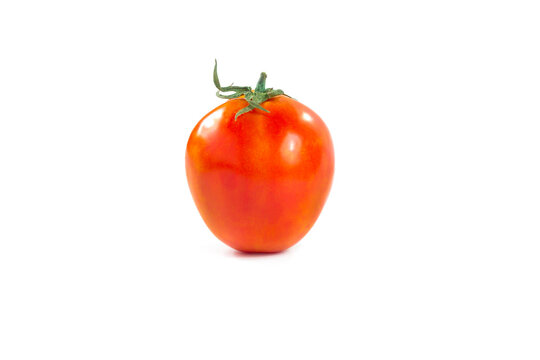 Fresh tomato isolated on white background with clipping path.