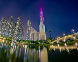 Beautiful evening at landmark 81, the tallest building in Vietnam. The building lights up with...