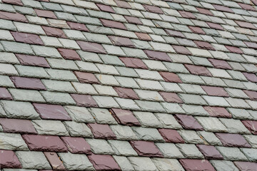 Slate roofing tiles on a historic building.  Attractive, durable roofing material. 