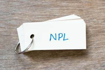 Flash card with handwriting in word NPL (Abbreviation of Non Performing Loan, Non-Patent...