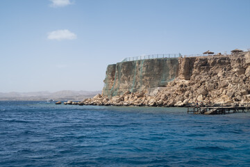 Fototapeta na wymiar Red Sea in the Gulf of Aqaba, surrounded by the mountains of the Sinai Peninsula, Dahab, Egypt
