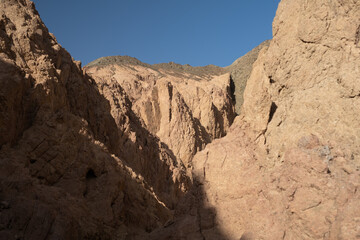 Sinai mountains at daytime, blue sky, top view of the mountains, colorful canyon at sunset in Egypt sunny day, landscape