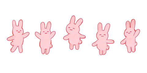 笑顔で並んだピンクのウサギ