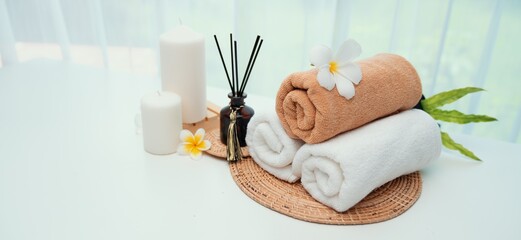 Naklejka na ściany i meble Spa accessory composition set in day spa hotel , beauty wellness center . Spa product are placed in luxury spa resort room , ready for massage therapy from professional service .