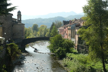 Lunigiana. Bridge over the river in Pontremoli.The Magra River in Lunigiana with houses and the...