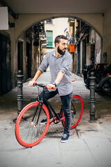 Young hipster man on fixie bicycle