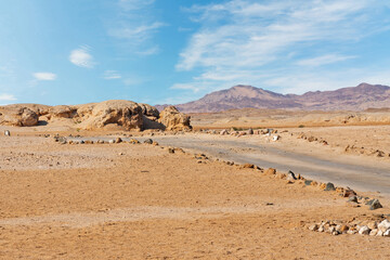 Fototapeta na wymiar Desert of Ras Mohammed National Park with rock in form of leon head, Sinai, Egypt