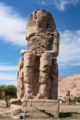 Egypt: Colossi of Memnon - massive stone statues of the Pharaoh Amenhotep III at the front of the ruined Mortuary Temple