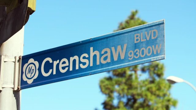 Lockdown Of A Crenshaw Street Sign Against A Blue Sky  - Los Angeles, California